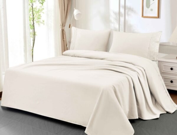 SET DE SÁBANAS 4 PCS COLOR ENTERO CON BORDADO INGLÉS (CAJAX48UND)