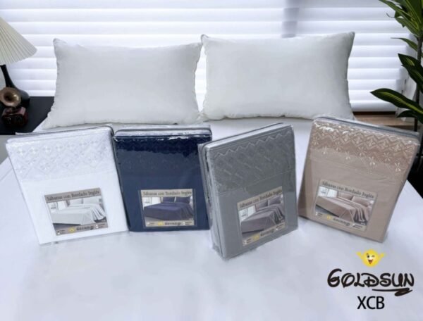 SET DE SÁBANAS 4 PCS COLOR ENTERO CON BORDADO INGLÉS (CAJAX48UND)