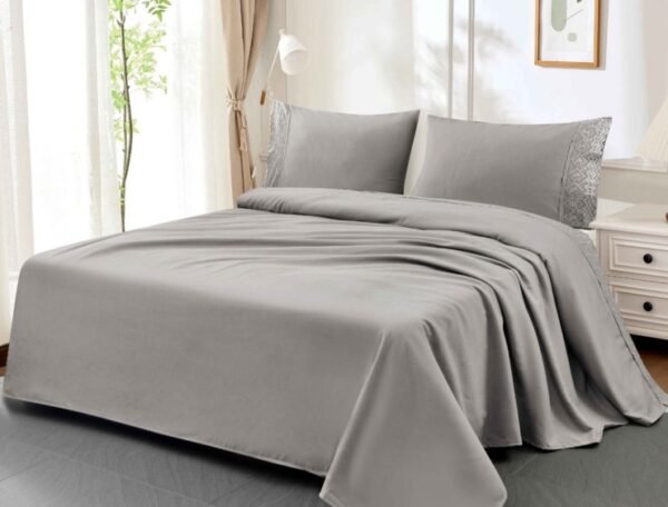 SET DE SÁBANAS 4 PCS COLOR ENTERO CON BORDADO INGLÉS (CAJAX48UND)